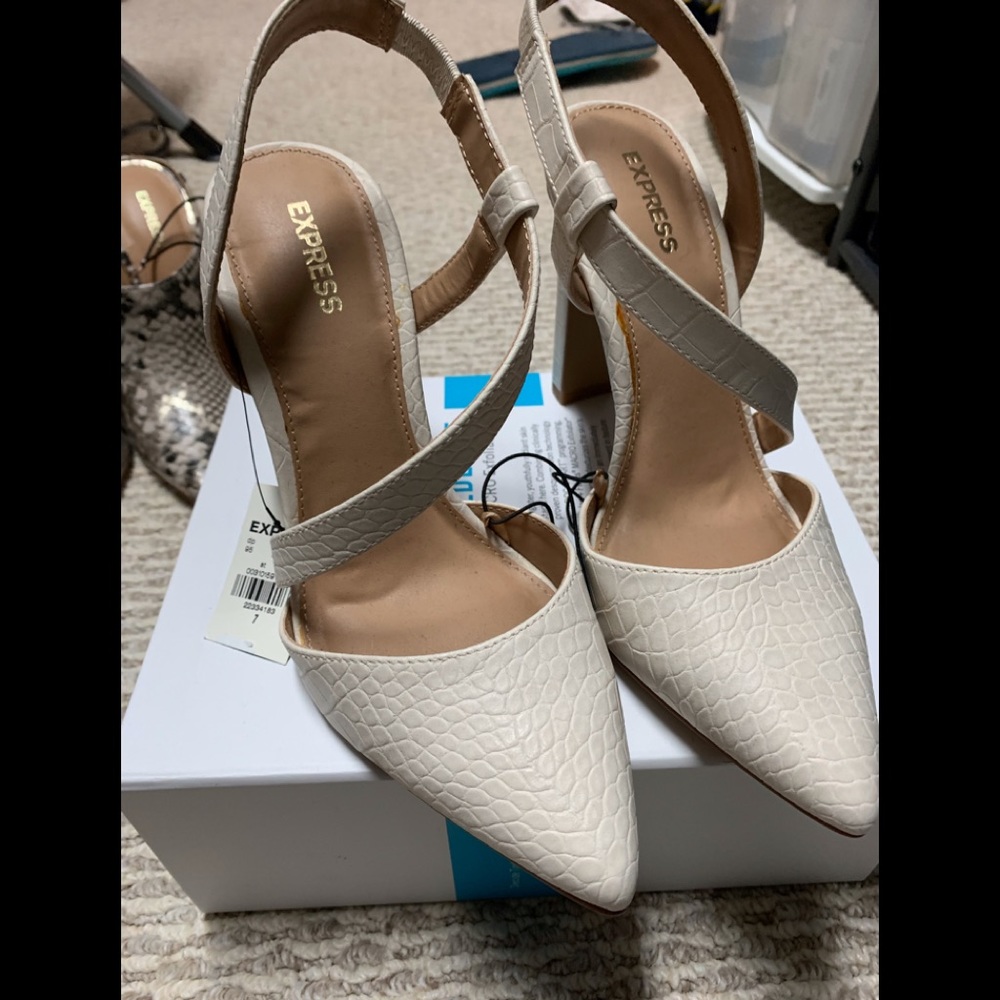 asymmetrical strappy closed toe pumps